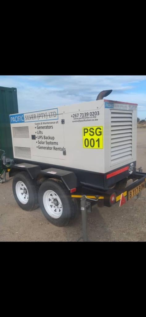 a mobile generator is parked on the side of the road